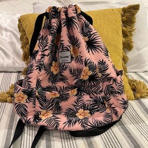 Absolutely adorable back pack. Draw string. Cute floral colors